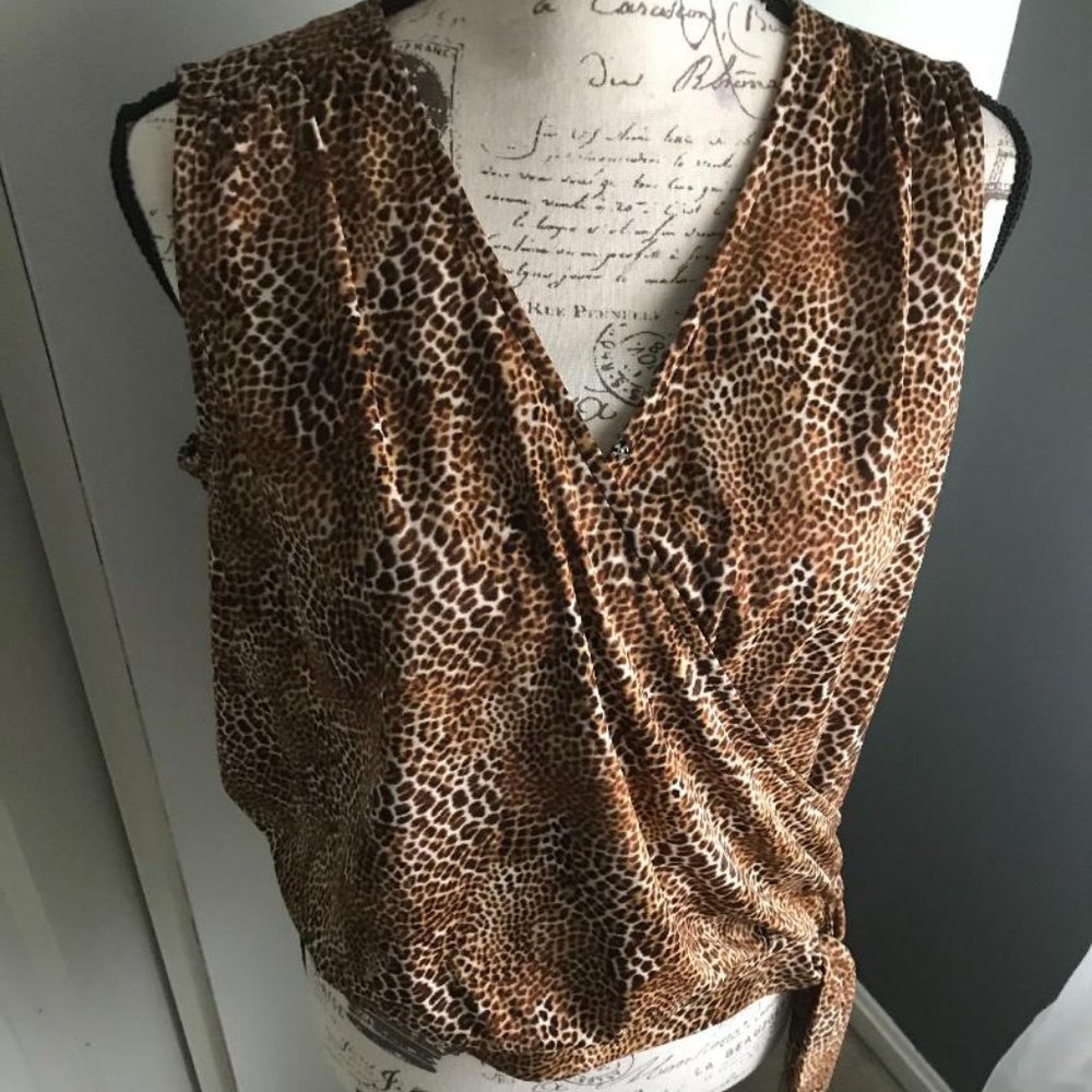 Animal print sleeveless wrap top
